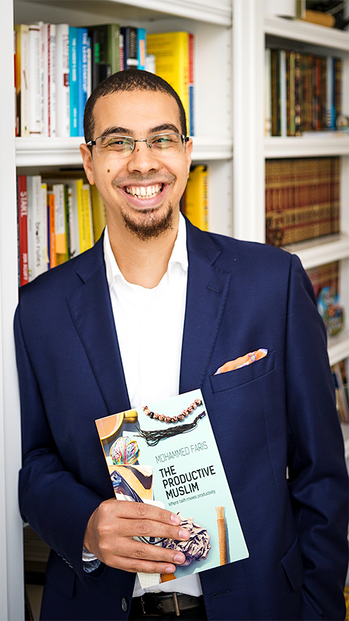 Mohammed Faris Holding Productive Muslim Book